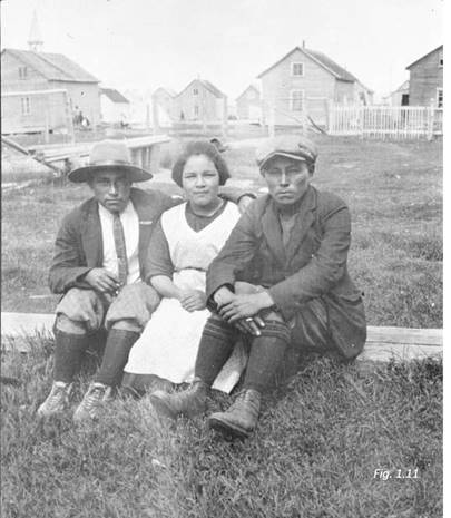 Photograph taken in 1925 by Frederick Johnson

Photograph taken in 1925 by Frederick Johnson, "Two unidentified young men and an unidentified girl of mixed French/Innu descent", Uashat-Maliotenam, summer 1925, National Museum of the American Indian (Smithsonian), catalogue number N14792), Exhibit P-68, Tab 373.